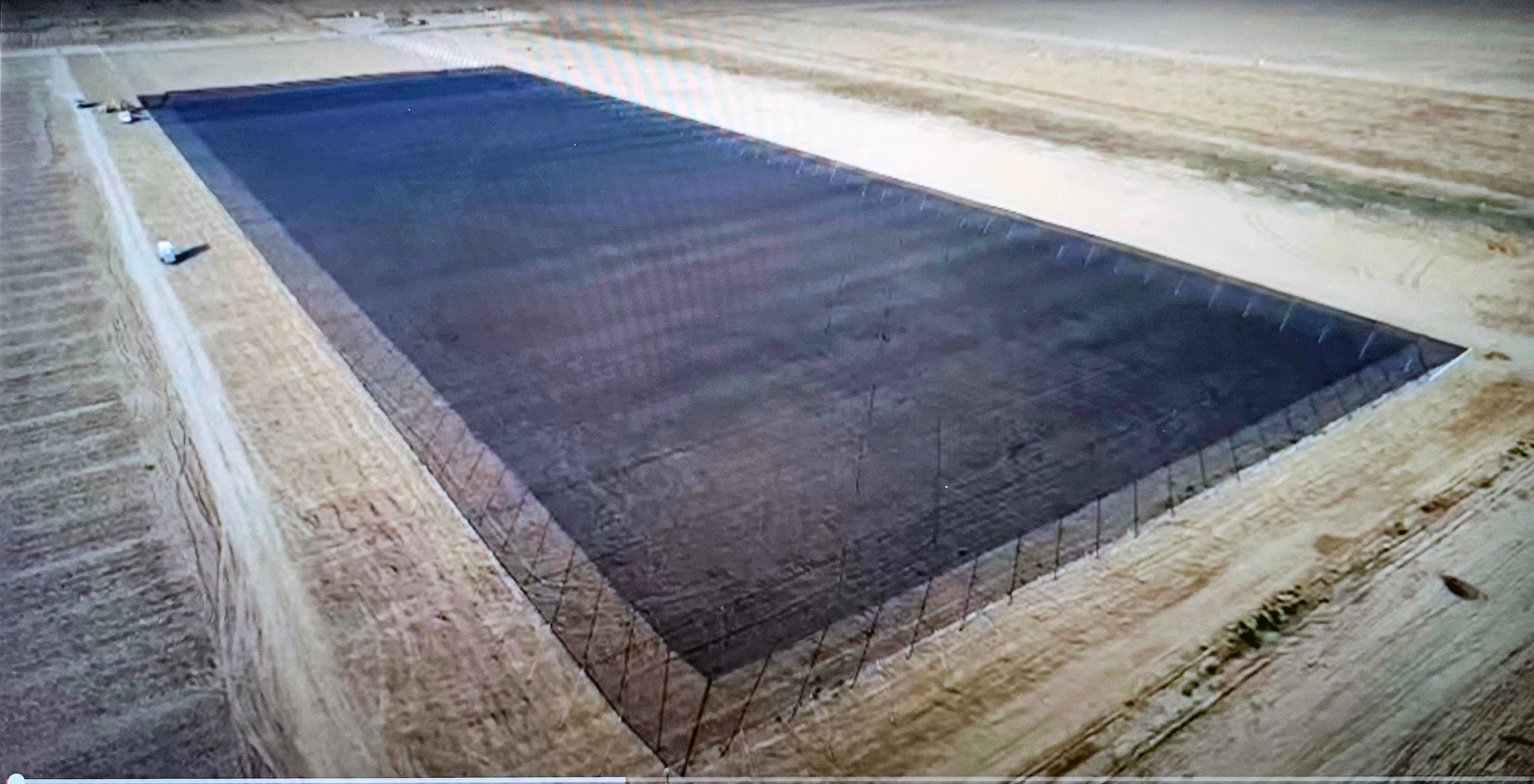 Aerial view of 10-acre shade structure (320' x 1,320') in agricultural landscape